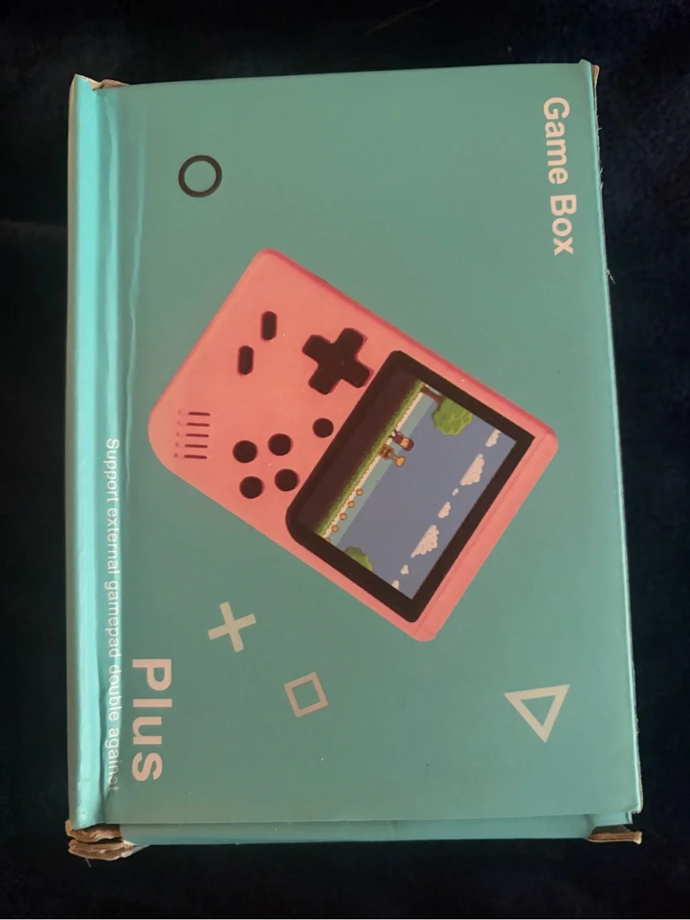 Handheld Retro-Style Gaming Console in Light Green